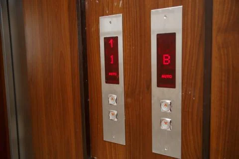 Elevator call buttons. selective focus, shallow depth of field Stock Photos