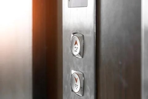 Elevator call buttons. selective focus, shallow depth of field Stock Photos