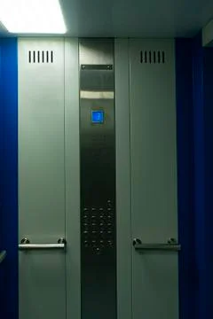 The elevator car from the inside while driving. Stock Photos