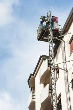 Elevator construction attached to the wall. Stock Photos