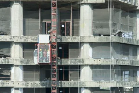 Elevator for construction the workers up full. Stock Photos