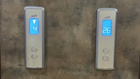Elevator control panel displays with floor numbers in blue digital screens,.. Stock Footage 324707410