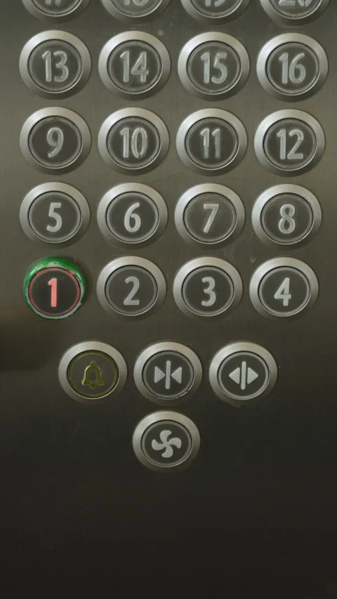 Elevator control panel with first floor button active while moving close up. Stock Footage 329226060