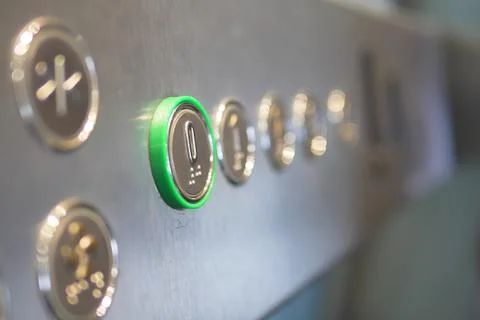 Elevator control panel with illuminated button in modern building Foto stock
