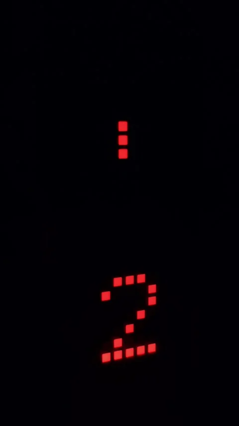 Elevator digital led display showing first floor with red pixelated number one Stock Footage 335644969