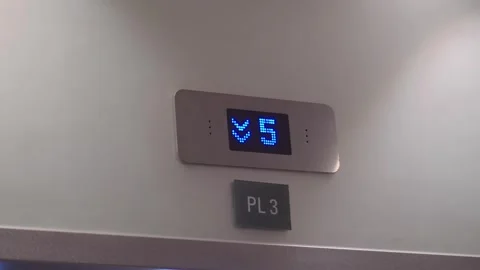 Elevator display shows floor number in a building Stock Footage 338154814