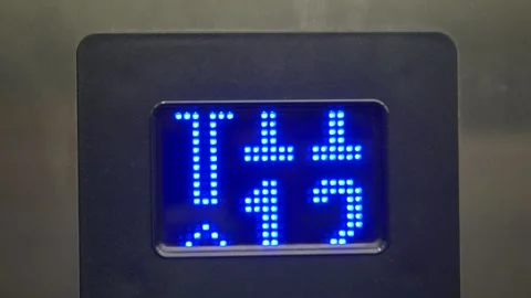 Elevator display shows floor ten and direction indicators Vídeos de archivo 311092484