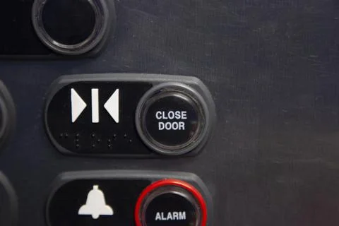 Elevator door button to close Stock Photos