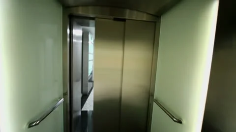 Elevator door opens on floor with security checking frames Video stock 26084184