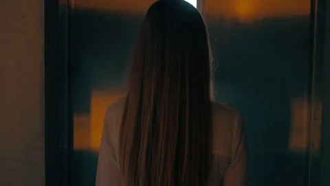 The elevator door opens in front of the woman who goes inside Video stock 88990170