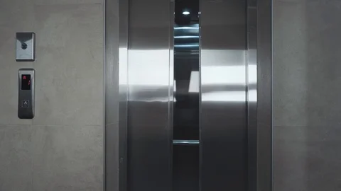 The elevator doors open. Stock Footage 111159664