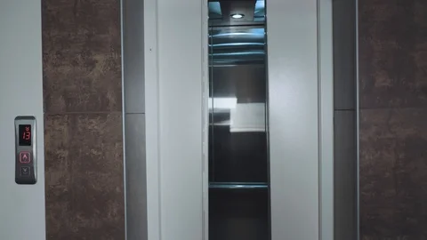 The elevator doors open. Opening the door is an elevator. Stock Footage 111448296