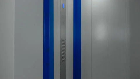 The elevator doors open. Opening the door is an elevator. Stock Footage 147343575