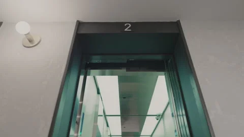 The elevator doors open. Opening the door is an elevator. Metal doors smoothly Stock Footage 293573456