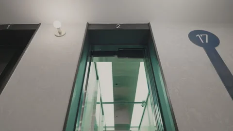The elevator doors open. Opening the door is an elevator. Metal doors smoothly Stock Footage 293574021
