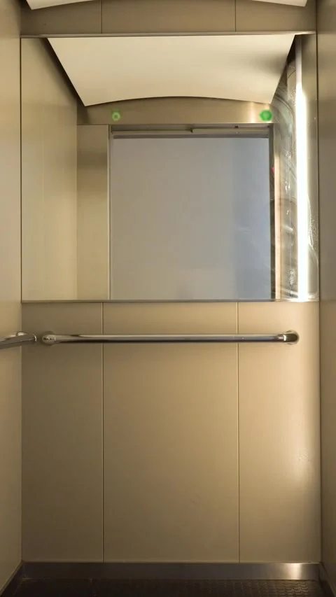Elevator doors opening and closing in a modern building Stock Footage 345589284