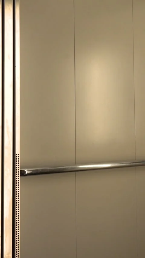 Elevator doors opening and closing Stock Footage 345589307