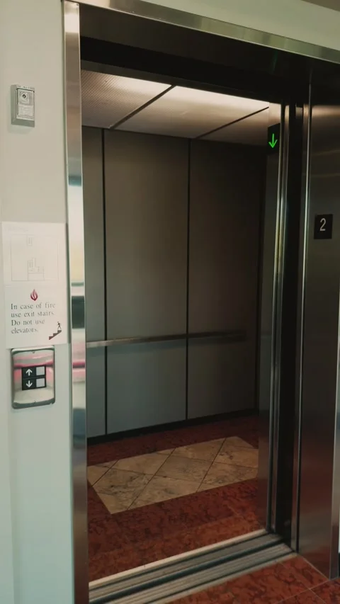 Elevator Doors Opening and Closing Stock Footage 345972094