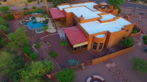 Elevator down with pan up Supersitition mountain home AZ.mp4 Stock Footage 54254205