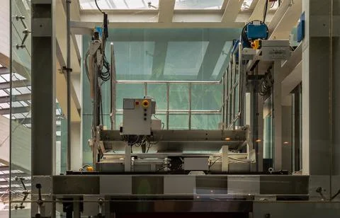 Elevator engine glass room with elevator motor. Motor driven Elevator cable c Foto stock