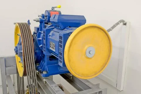 Elevator engine room with big elevator motor Elevator engine room with big... Stock Photos