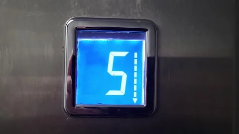 Elevator floor display panel showing descent movement Stock Footage 330714080