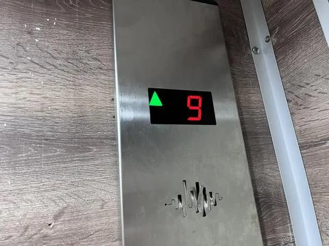 Elevator floor indicator showing ninth floor 스톡 사진