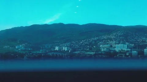 Elevator flow up on high business building center, over city landscape. Stock Footage 80574132