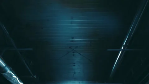 Elevator goes up long dark shaft with built-in lights Video stock 166353496