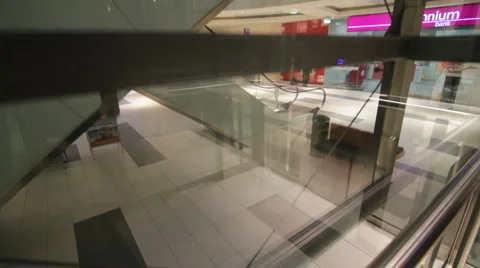 Elevator goes up in a modern shopping mall Stock Footage 1075747