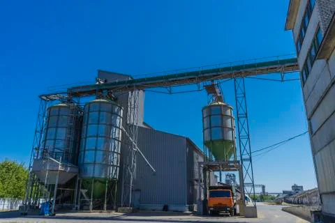 Elevator grain loading point and granary. Complex for storing grain, corn, su Stock Photos