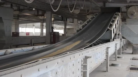 At the elevator the grain is transported on a conveyor belt Stock Footage 227159381