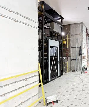 Elevator Installation, Lift Technician Installing a Modern Elevator Stock Photos