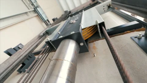 Elevator lift cabin moves up inside illuminated elevator shaft with Stock Footage 138168530