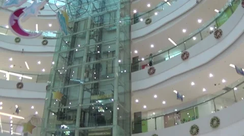 Elevator moving in the dome of a shopping mall Stock Footage 42810963