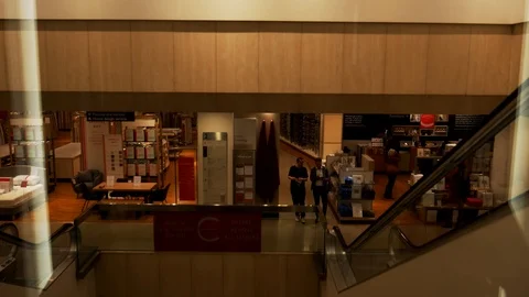 Elevator moving up in a mall Stock Footage 112728931