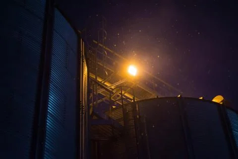 Elevator at night sometimes performs work on receiving, cleaning, drying and  Stock Photos