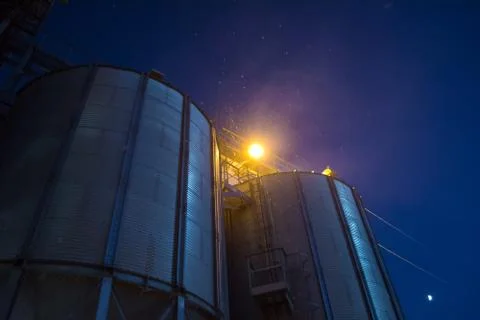 Elevator at night sometimes performs work on receiving, cleaning, drying and  Stock Photos