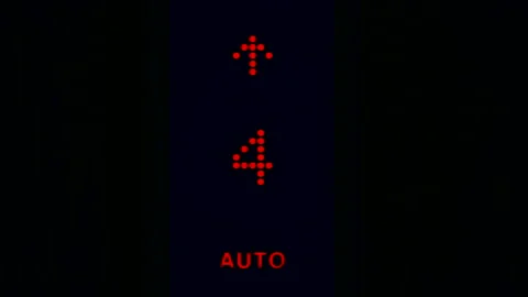 Elevator numbers on a black background. Changing numbers and a moving elevator Stock Footage 150858659