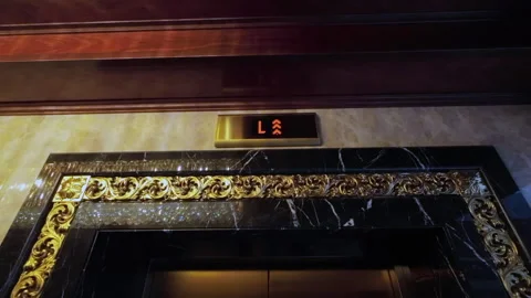 Elevator opening doors. Luxury interior in hotel or apartment. Stock Footage 235385413