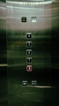 Elevator panel featuring 4 floors and 1 basement level. Stock Photos