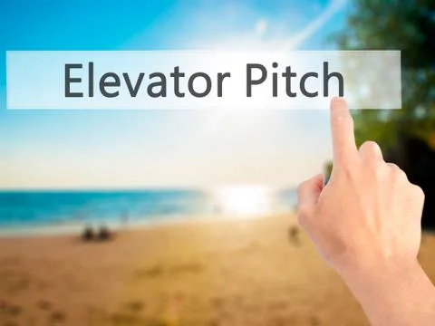 Elevator Pitch - Hand pressing a button on blurred background concept on visu Stock Photos