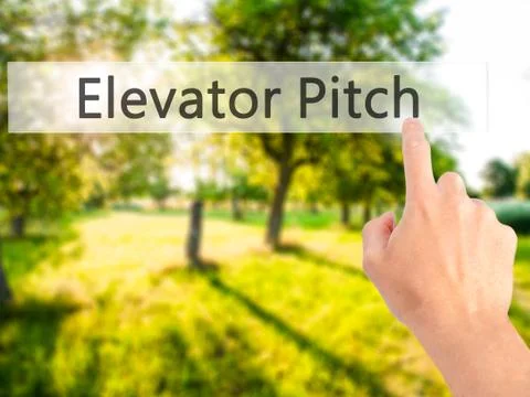 Elevator Pitch - Hand pressing a button on blurred background concept on visu Stock Photos