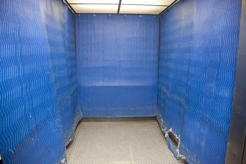 Elevator with protective covering for moving 스톡 사진