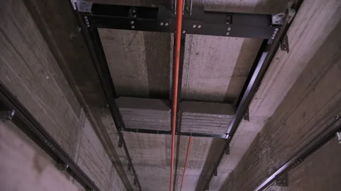 Elevator shaft with guide rails and cables Stock Footage 300336396