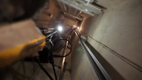 Elevator shaft tunnel. Elevator shaft of a multi-storey building. Stock Footage 145424562