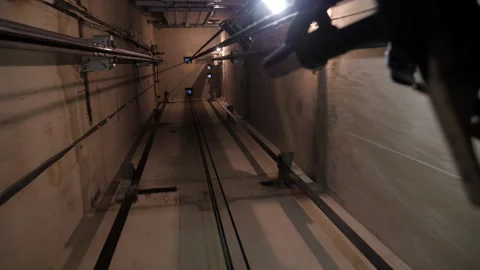 Elevator shaft tunnel. Elevator shaft of a multi-storey building. Stock Footage 149989593