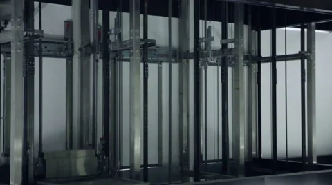In the Elevator Shaft of View. a Cage Arrives at the Floor Stock Footage 60998765