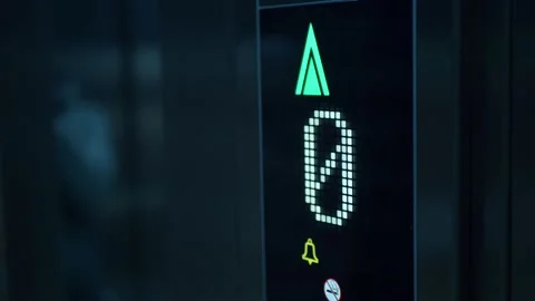 Elevator shows signs for going up and down in a building Stock Footage 337059730