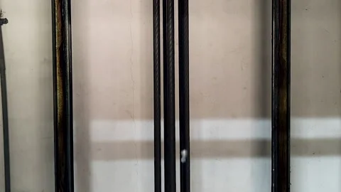 Elevator Steel Cables Moving Inside Lift Shaft Close Up Industrial Mechanism Stock Footage 335193831